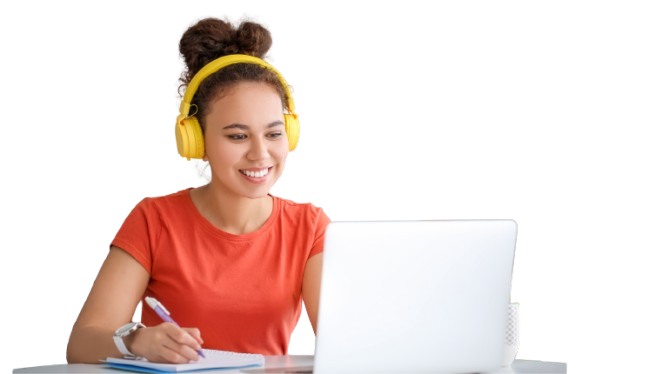 Young adult with headphones studying at a laptop — CoachBridge coaching